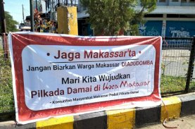 Jaga Makassar Ta’, Spanduk Imbauan Pilwalkot Damai Bertebaran di Pinggir Jalan