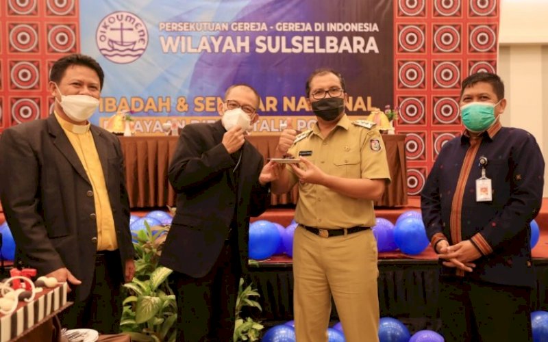 HUT PGI. Wali Kota Makassar, Moh Ramdhan Pomanto, saat hadir dalam HUT PGI Wilayah Sulselbara ke-71 di Hotel Max One Makassar, Selasa (25/5/2021). foto: humas pemkot makassar