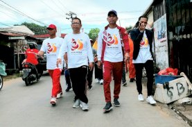 Rudianto Lallo Sumbang Motor Hadiah Jalan Sehat SMPN 36 Makassar