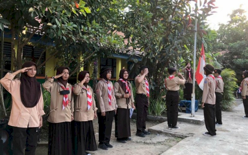 KEMAH BLOK. Gerakan Pramuka Gugus Depan SMPN 4 Pallangga, Kecamatan Pallangga, Kabupaten Gowa, baru saja menggelar Kemah Blok (Ekstra Kurikuler Wajib Pendidikan Kepramukaan) yang dirangkaikan Perkemahan Sabtu-Minggu (Persami), 29 hingga 30 Juli 2023 lalu. foto: istimewa