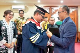 Jufri Rahman Raih Gelar Doktor dengan Predikat Cum Laude